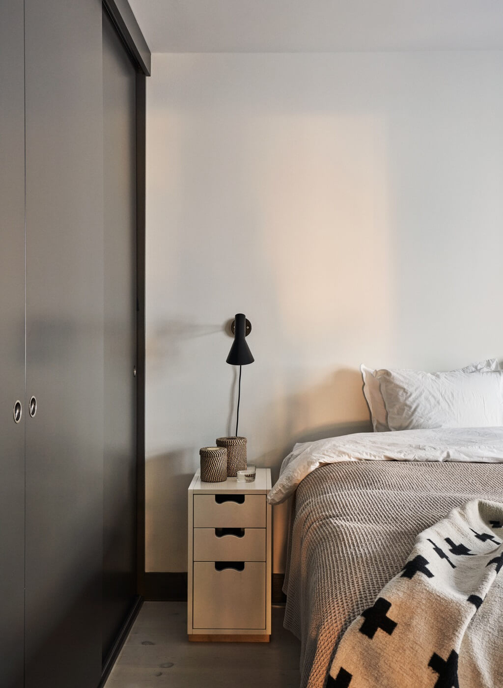 A Swedish Townhouse with Industrial Details 11 master-bedroom-built-in-closet-nordroom