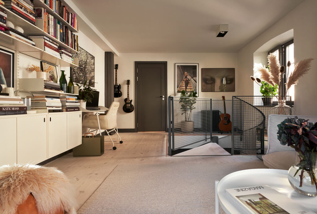 A Swedish Townhouse with Industrial Details 7 open-plan-living-room-home-office-bookshelves-scandinavian-home-nordroom
