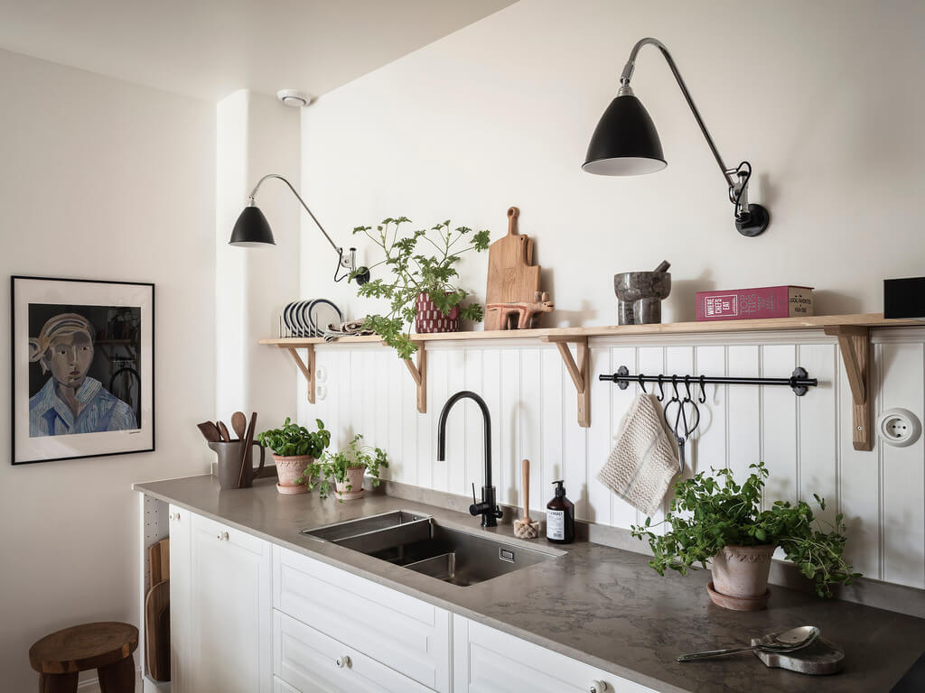 Subtle Color Touches in a Light Apartment 10 open-shelves-scandinavian-kitchen-nordroom