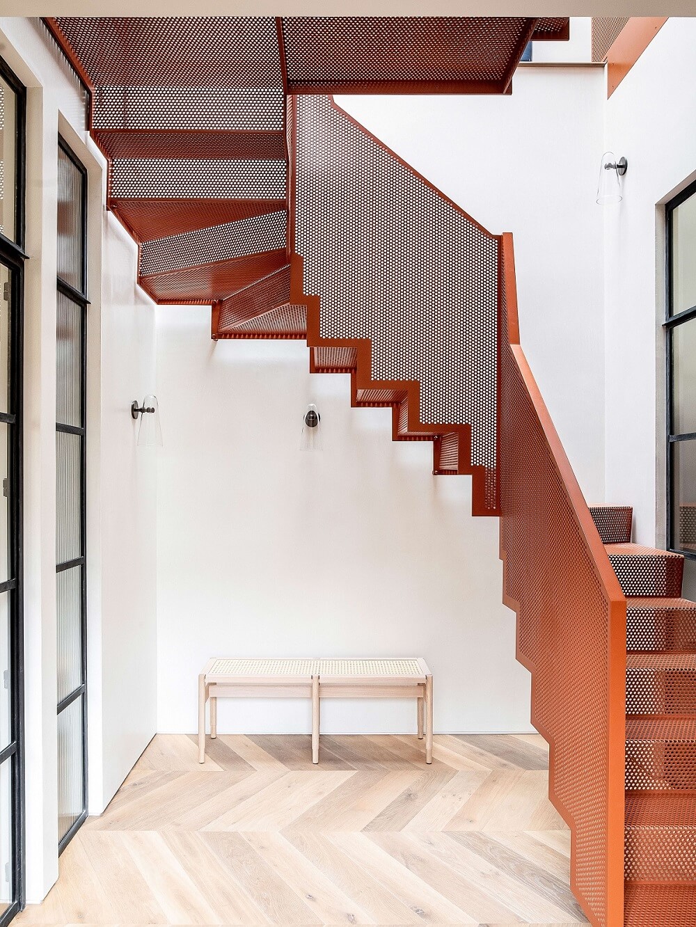 A Modern Playful Mews House in London 6 red-steel-staircase-modern-mews-house-nordroom