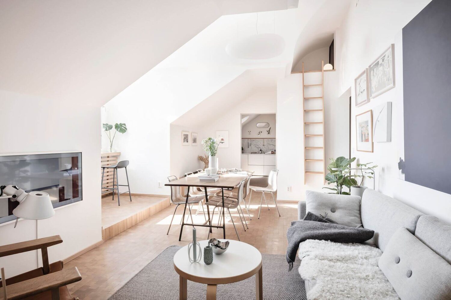Window Seats & Creative Ideas in a Light Attic Apartment 4 scandinavian-living-room-nordroom