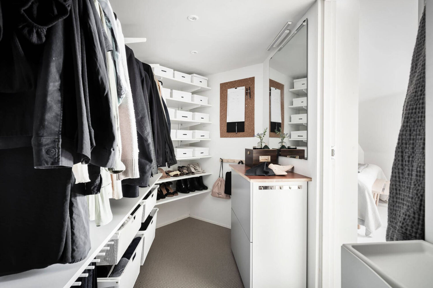 Window Seats & Creative Ideas in a Light Attic Apartment 17 walk-in-closet-nordroom