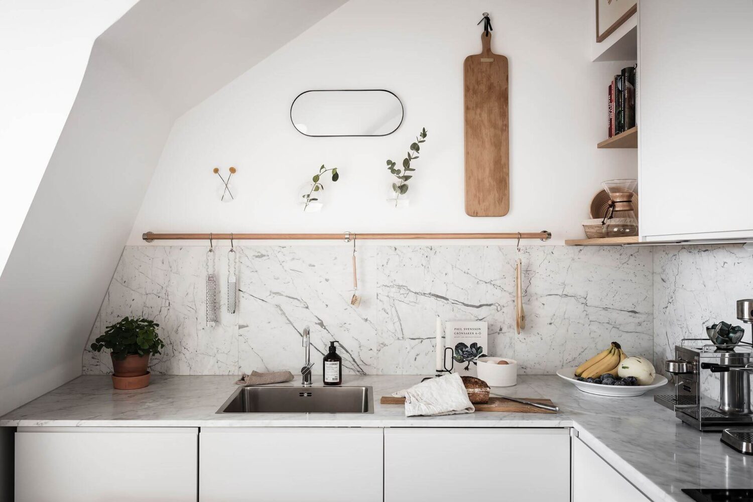 Window Seats & Creative Ideas in a Light Attic Apartment 10 white-kitchen-attic-apartment-nordroom