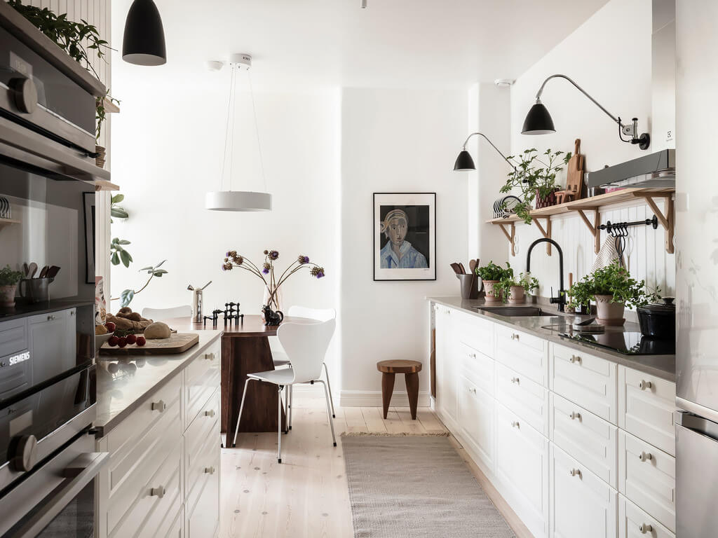 Subtle Color Touches in a Light Apartment 7 white-kitchen-open-shelves-nordroom