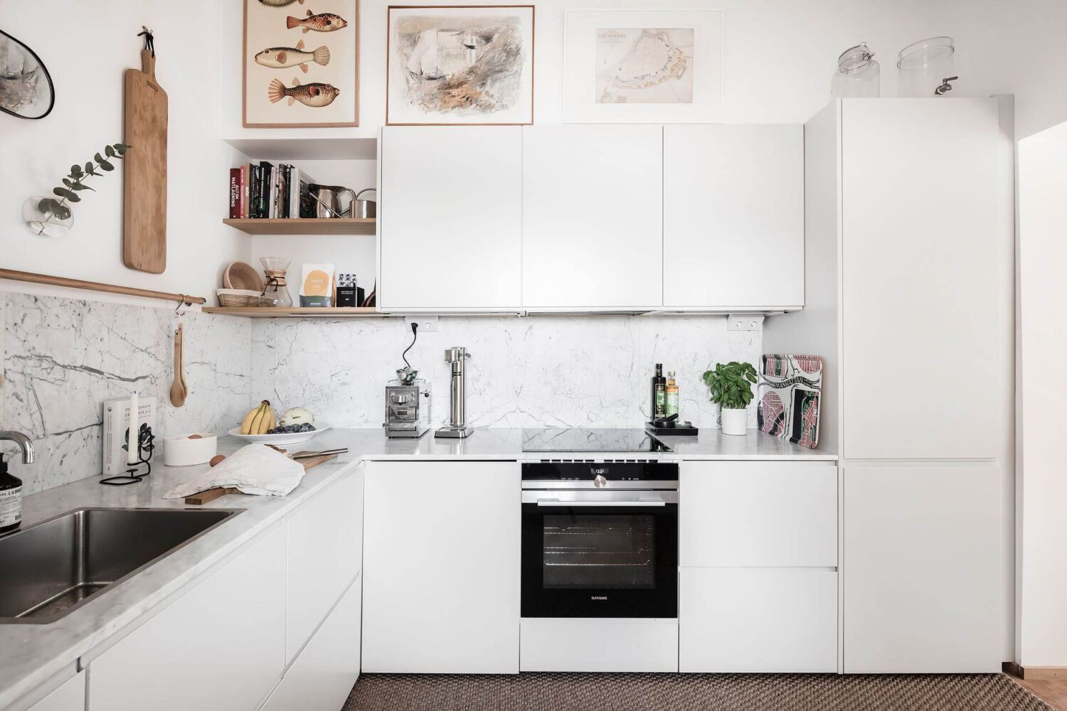 Window Seats & Creative Ideas in a Light Attic Apartment 9 white-kitchen-scandinavian-decor-nordroom