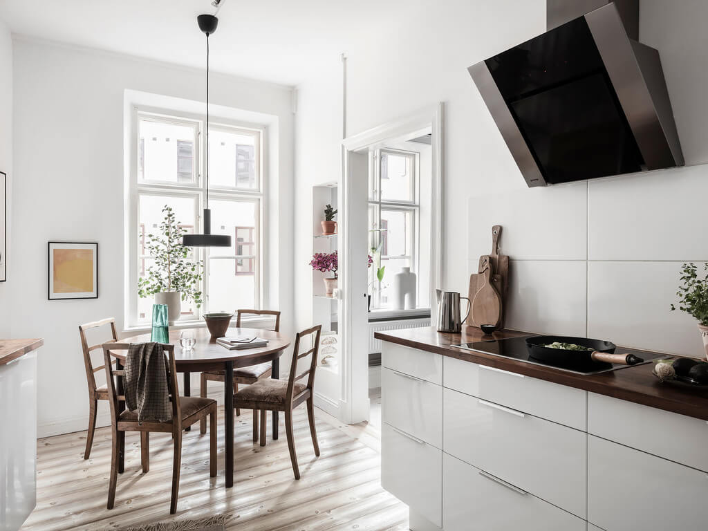 A Stylish Gray Scandinavian Apartment 20 white-kitchen-wooden-floor-nordroom