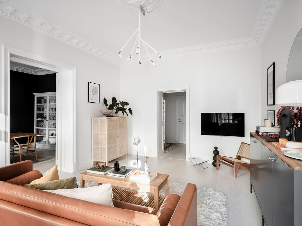 A Black Dining Room in a Stylish Apartment 9 white-living-nordroom