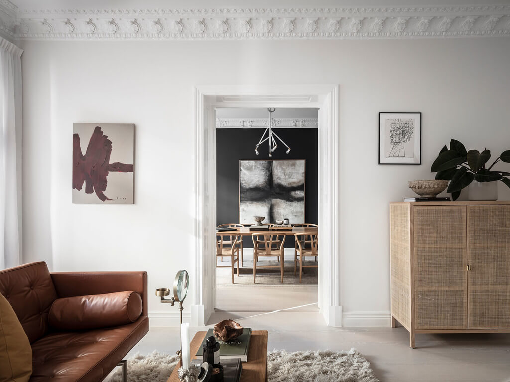 A Black Dining Room in a Stylish Apartment 10 white-living-room-leather-sofa-nordroom