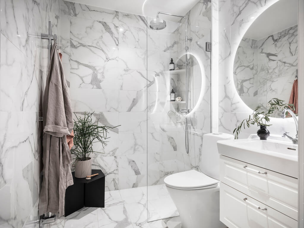 A Stylish Gray Scandinavian Apartment 24 white-marble-bathroom-scandinavian-design-nordroom