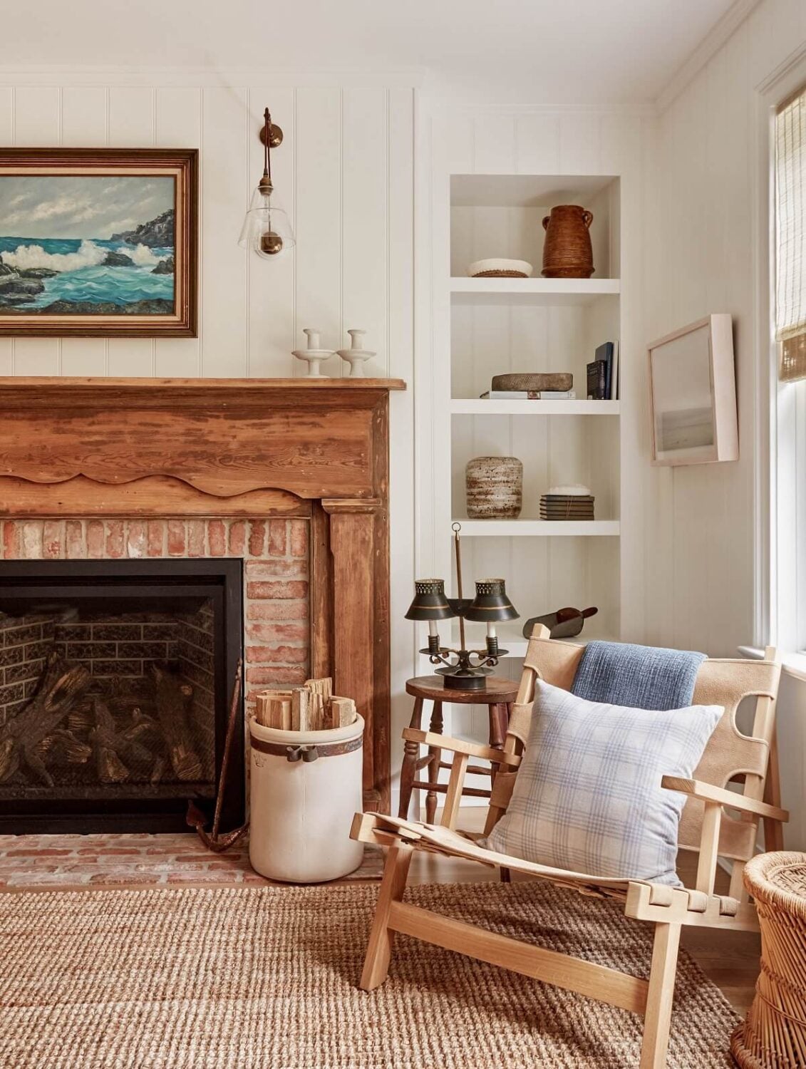 A Serene Surf Retreat in The Hamptons 11 wood-brick-fireplace-built-in-bookshelves-surf-retreat-becca-interiors-nordroom
