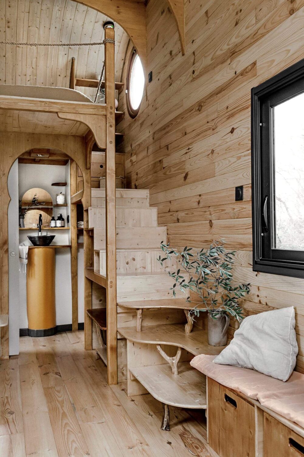 Curved Lines in a Wooden Tiny House 7 wooden-tiny-house-stairs-storage-bench-nordroom