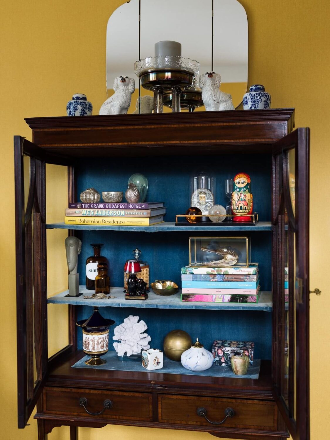 A Vibrant Colorful Scandinavian Apartment 9 antique-cabinet-yellow-living-room-nordroom