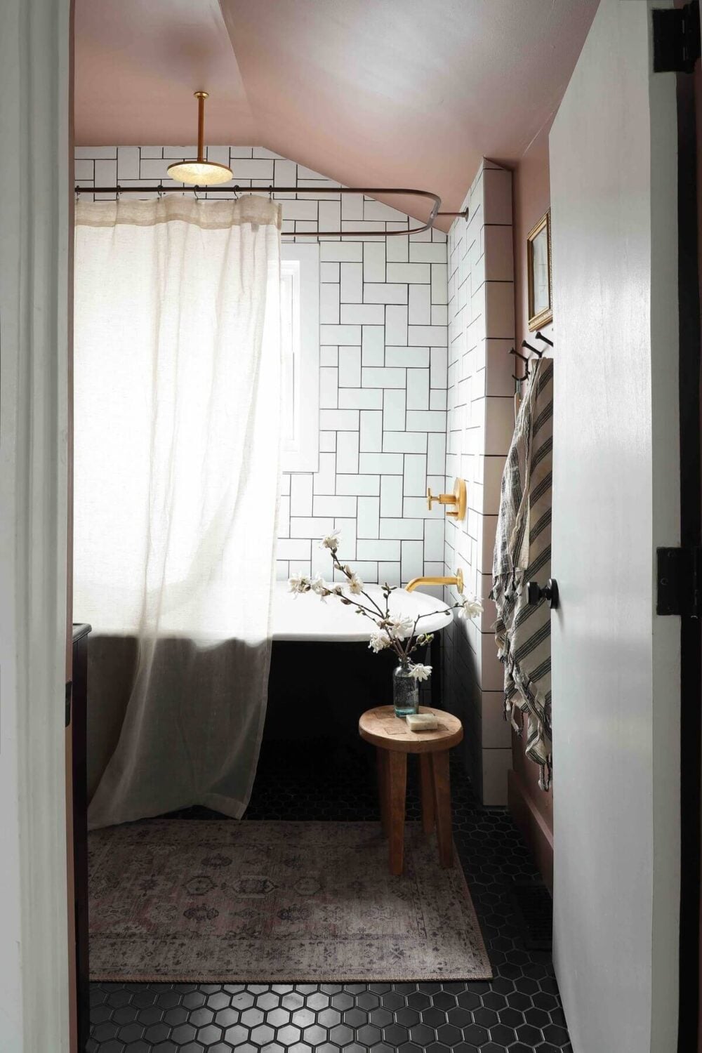 A Bright Renovated Home in Milwaukee 11 bathroom-black-floor-tiles-mocha-color-nordroom
