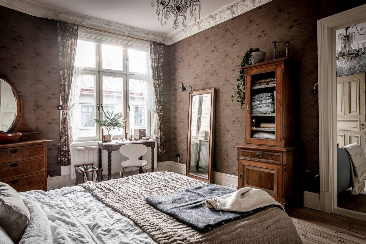 A Charming Vintage Apartment in Sweden 17 bedroom-brown-wallpaper-nordroom