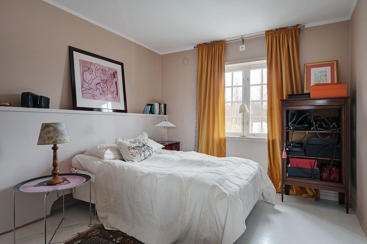 The Colorful Home of Artist Bobo Wallmansson 23 bedroom-yellow-curtains-colorful-eclectic-home-bobo-wallmansson-nordroom