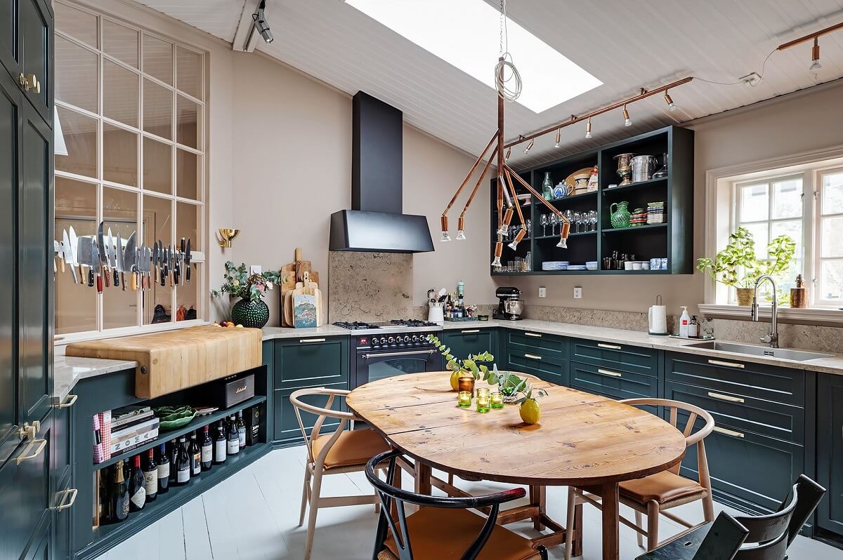 The Colorful Home of Artist Bobo Wallmansson 3 blue-kitchen-dining-table-colorful-home-bobo-wallmansson-nordroom