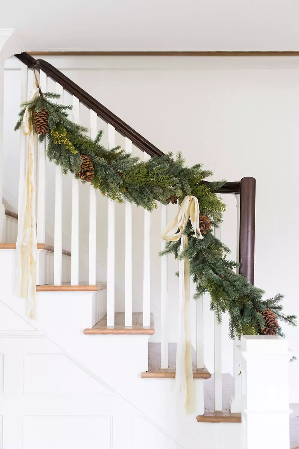 A Warm Christmas Home by Studio McGee 19 christmas-garland-staircase-nordroom