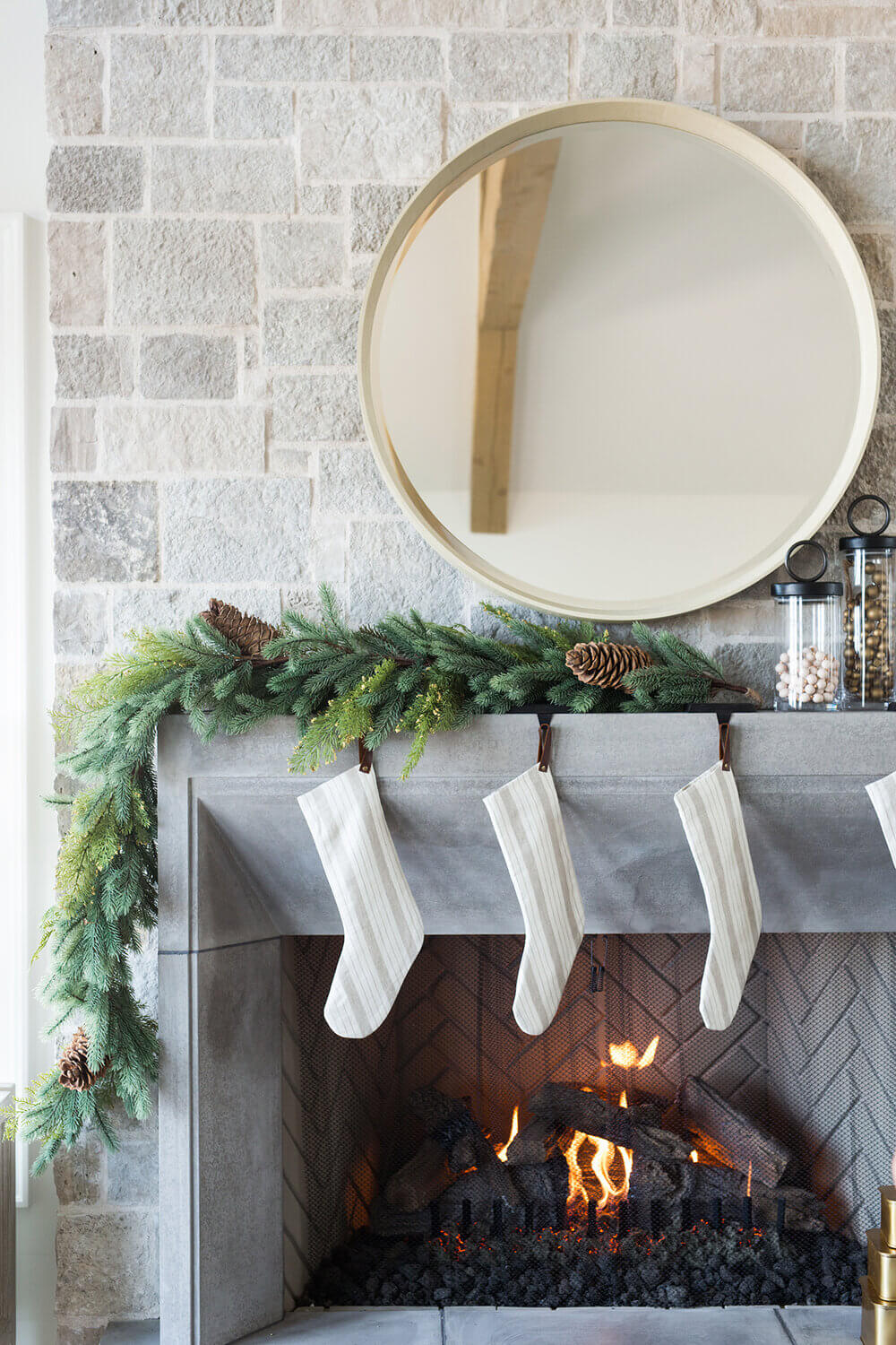 A Warm Christmas Home by Studio McGee 21 christmas-stockings-round-mirror-garland-nordroom