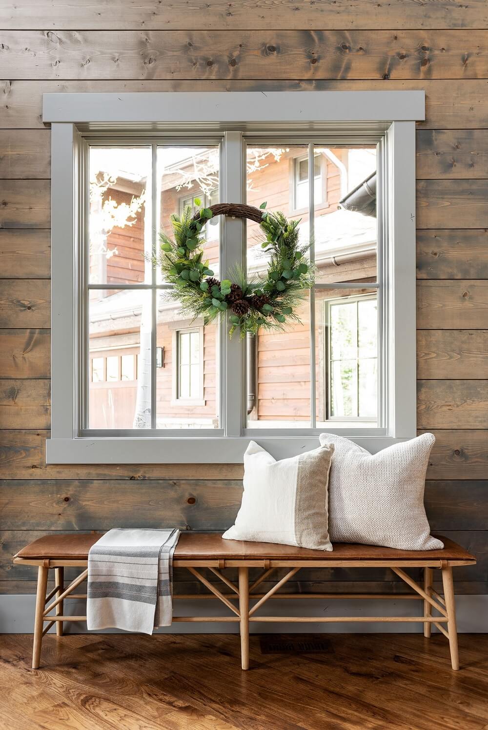 A Warm Christmas Home by Studio McGee 24 christmas-wreath-hallway-rustic-nordroom