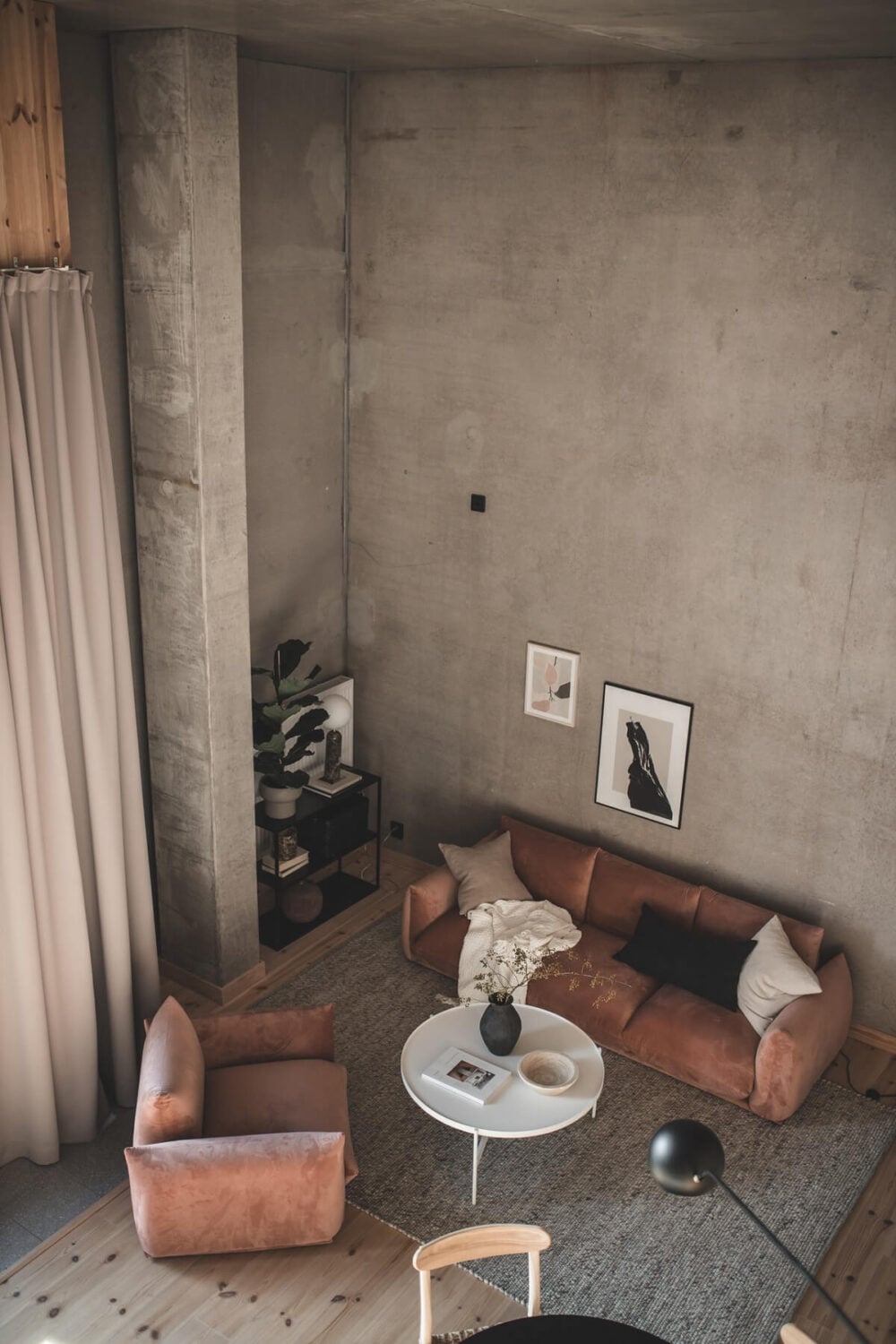 A Scandinavian Loft Made of Concrete and Wood 12 conrete-living-room-loft-high-ceilings-nordroom