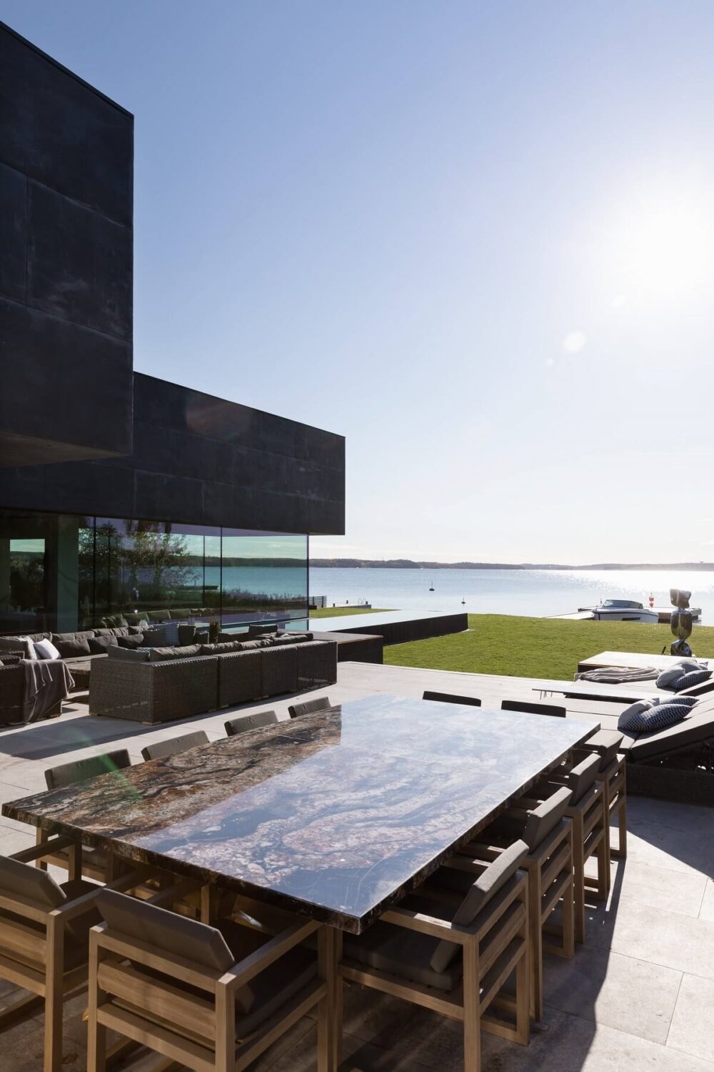 A Modern Architectural Villa in Sweden 32 garden-seating-modern-architectural-villa-stockholm-sweden-nordroom