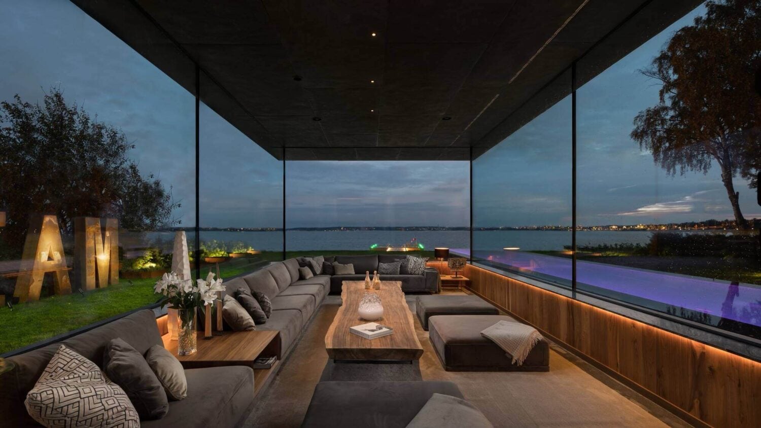 A Modern Architectural Villa in Sweden 3 glass-modern-sitting-room-modern-architectural-villa-stockholm-sweden-nordroom