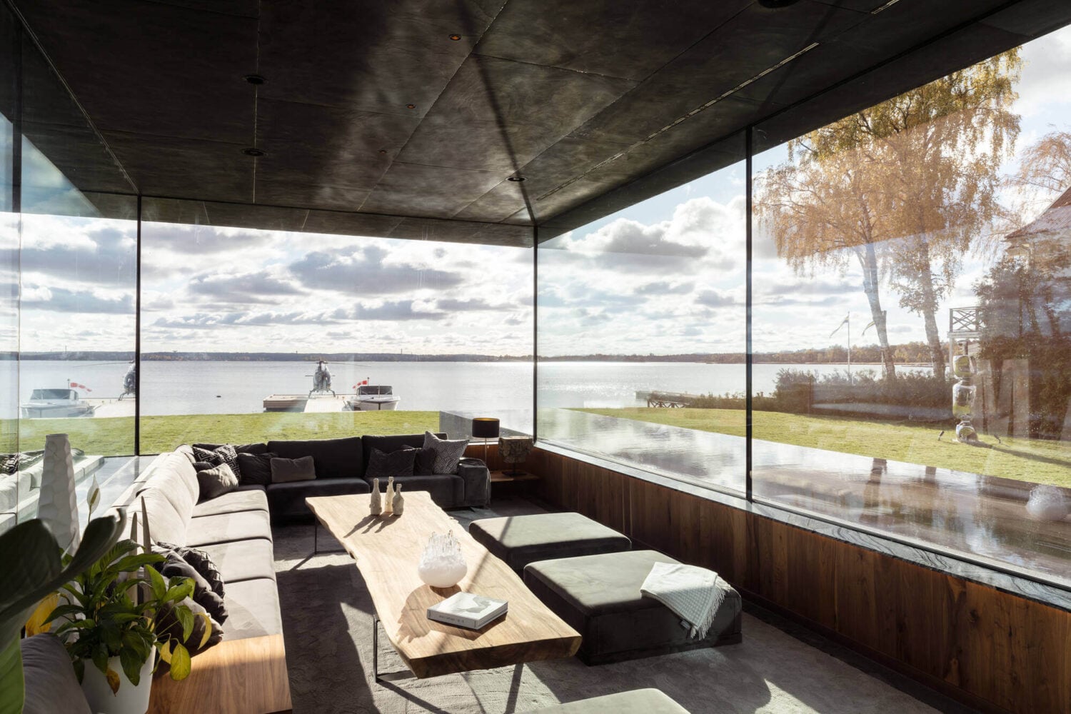 A Modern Architectural Villa in Sweden 4 glass-sitting-room-modern-architectural-villa-stockholm-sweden-nordroom