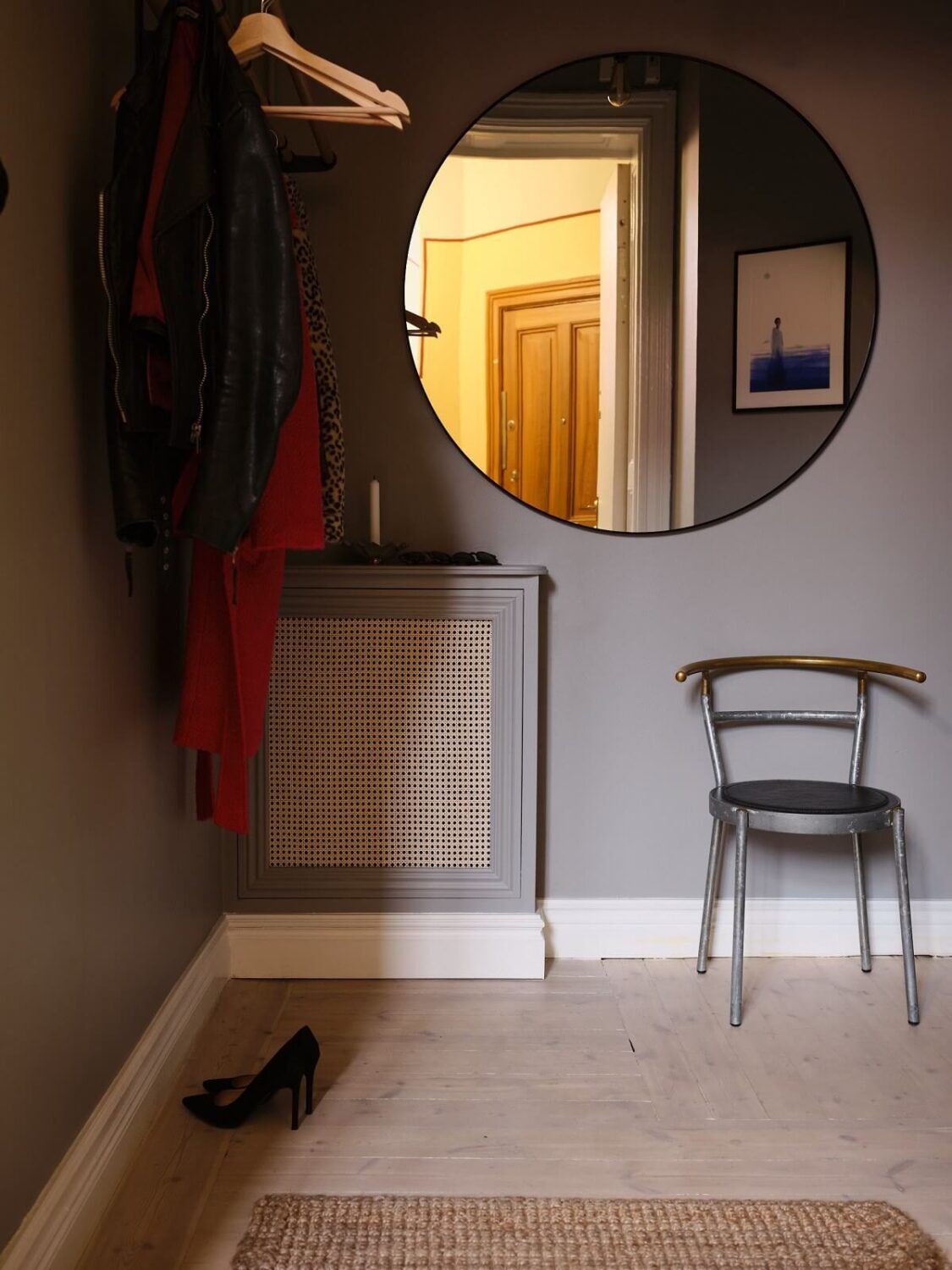 Apartment with Small Dark Blue Bedroom 17 hallway-large-round-mirror-nordroom