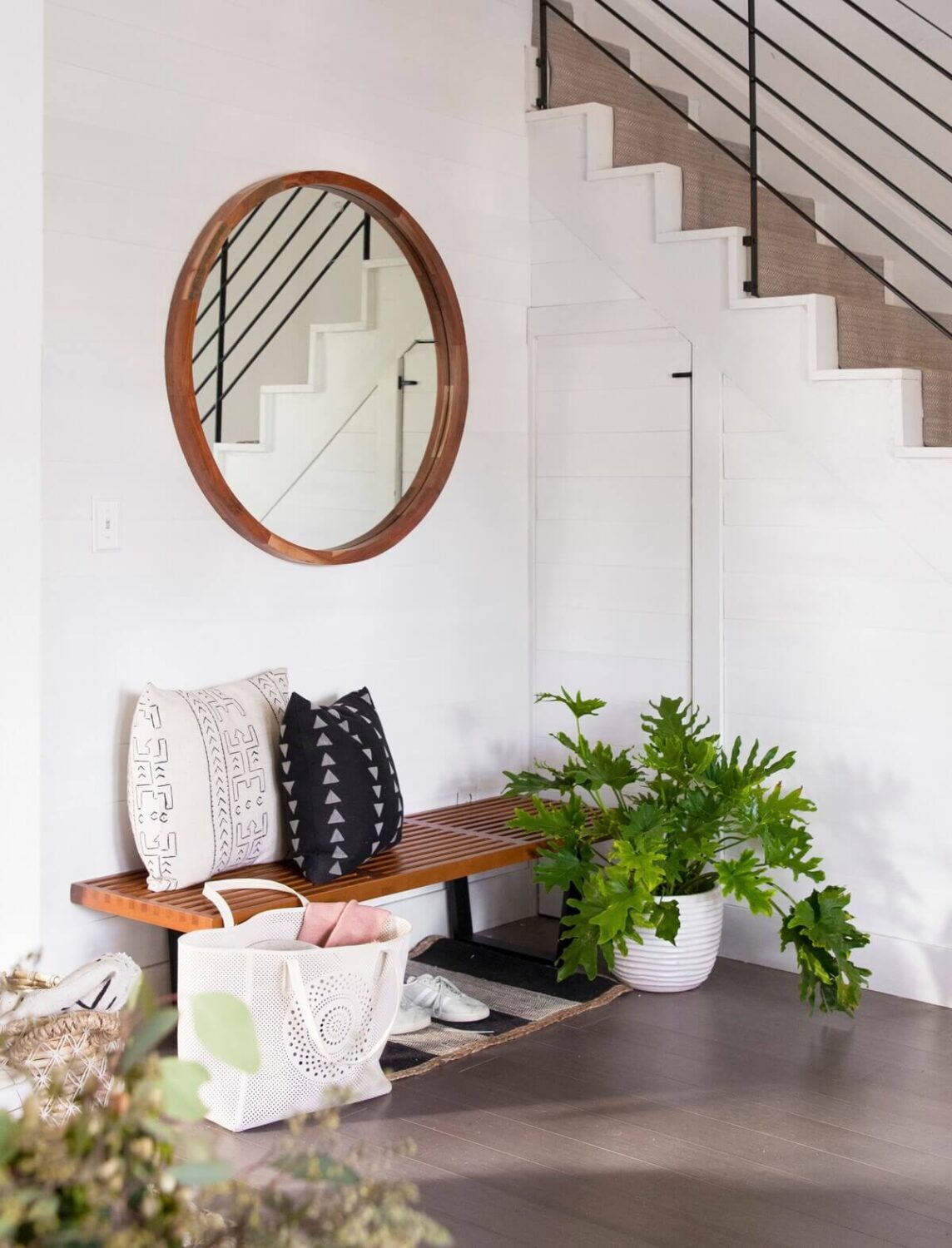 A Bright Renovated Home in Milwaukee 8 hallway-round-mirror-nordroom