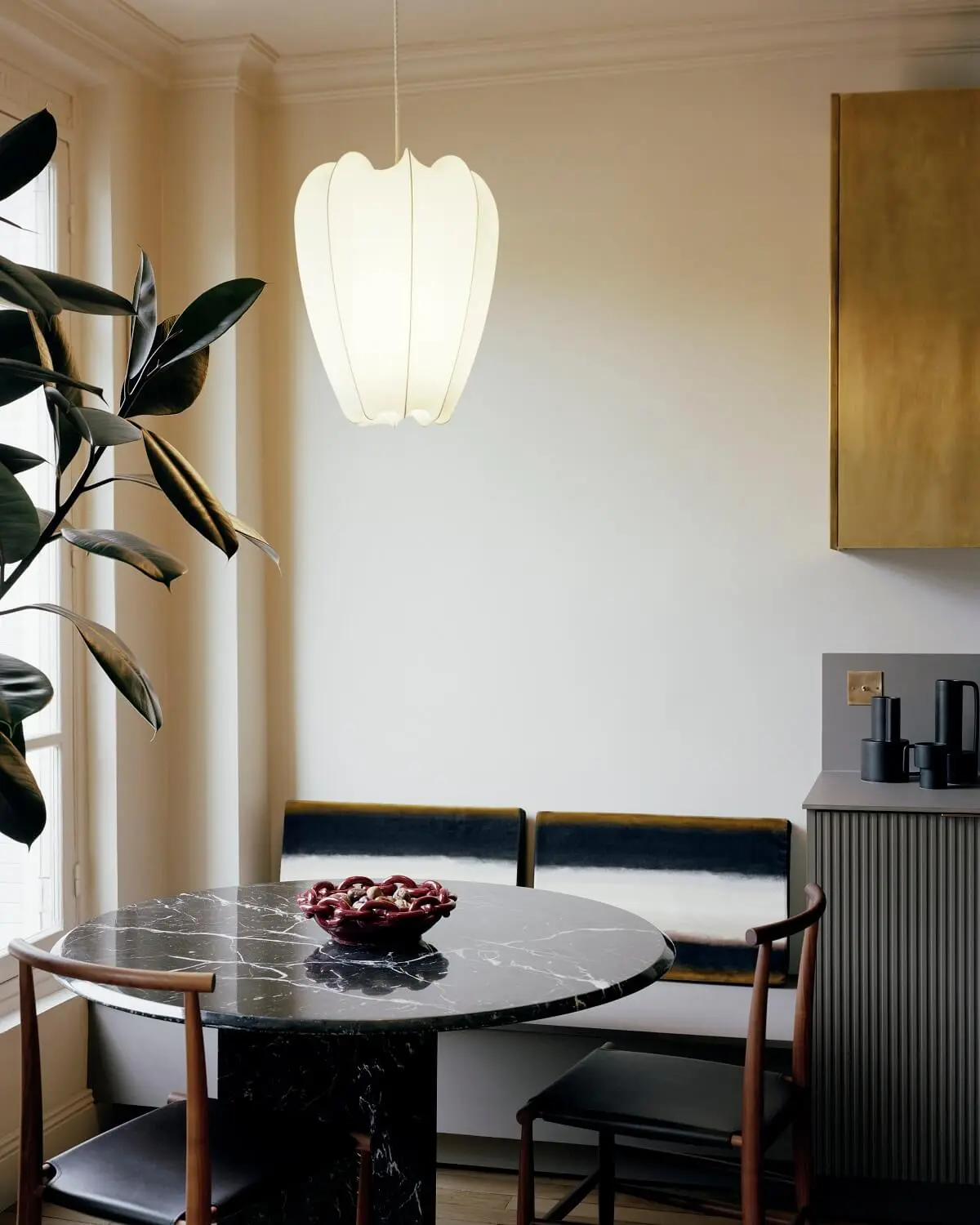 A Tiny Pied-à-Terre in Paris by Corpus Studio 2 kitchen-dining-area-round-table-pied-a-terre-paris-corpus-studio-nordroom