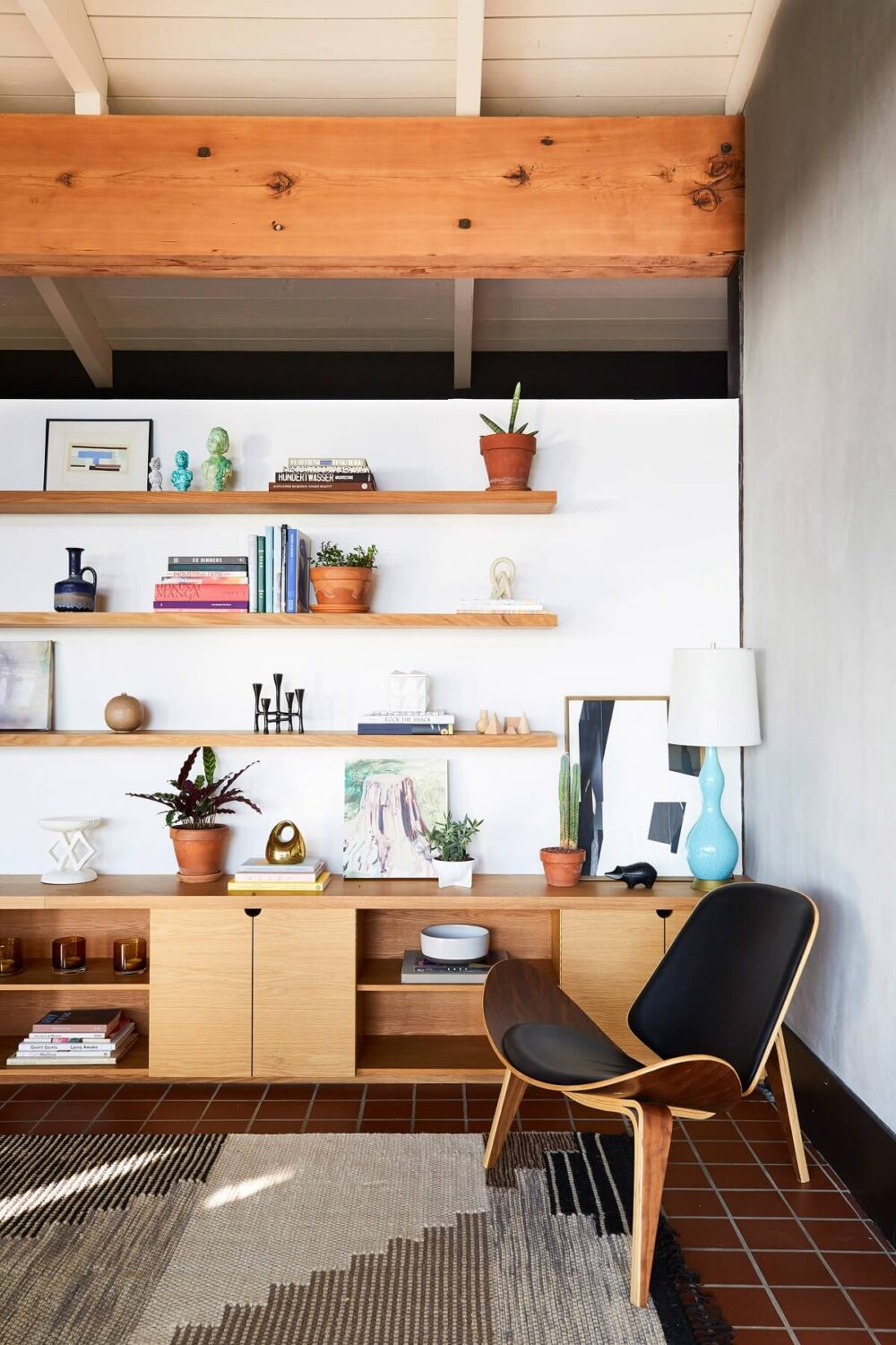 How To Style Terracotta Floor Tiles 18 living-room-terracotta-floor-shelves-wood-nordroom