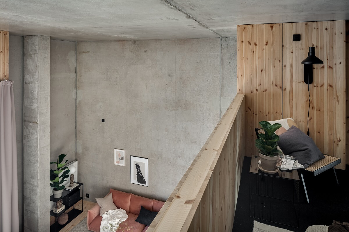 A Scandinavian Loft Made of Concrete and Wood 20 loft-bedroom-view-nordroom