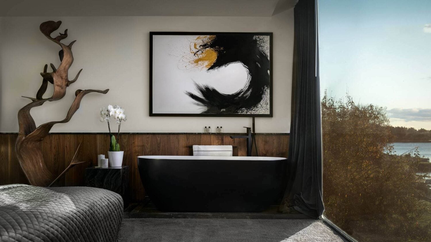 A Modern Architectural Villa in Sweden 15 master-bedroom-freestanding-bath-floor-to-ceiling-window-modern-architectural-villa-stockholm-sweden-nordroom