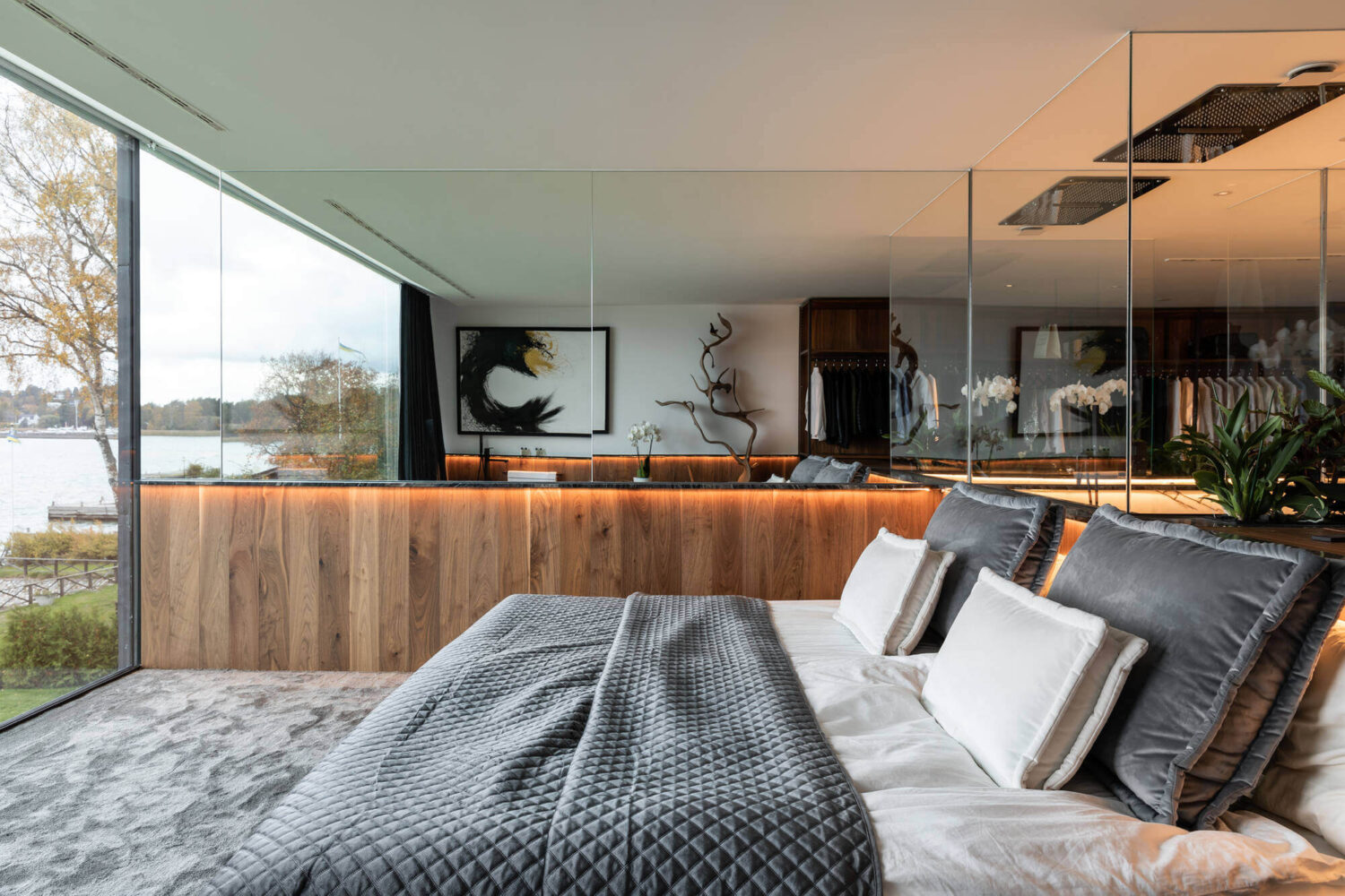 A Modern Architectural Villa in Sweden 13 master-bedroom-mirror-wall-modern-architectural-villa-stockholm-sweden-nordroom
