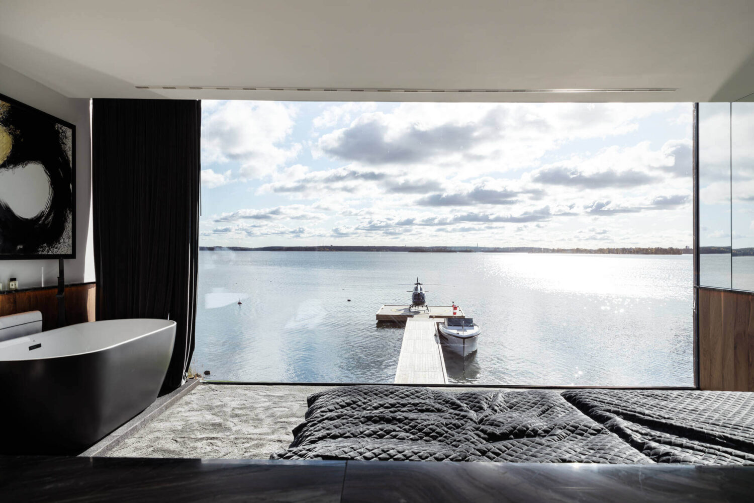 A Modern Architectural Villa in Sweden 14 master-bedroom-sea-view-freestanding-bath-modern-architectural-villa-stockholm-sweden-nordroom