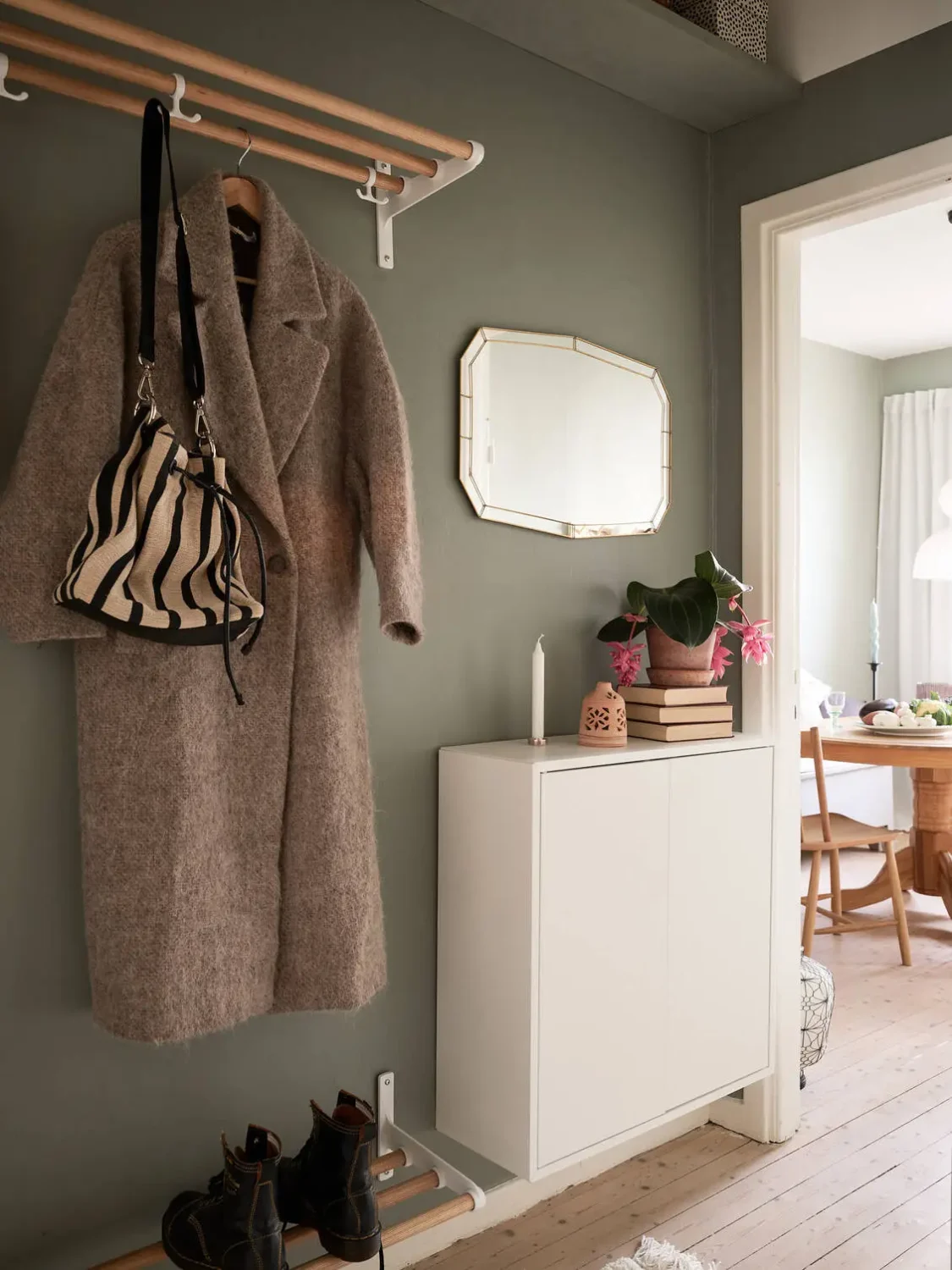 A Scandinavian Studio Apartment with Bed Nook 16 minimalistic-hallway-scandinavian-studio-apartment-nordroom