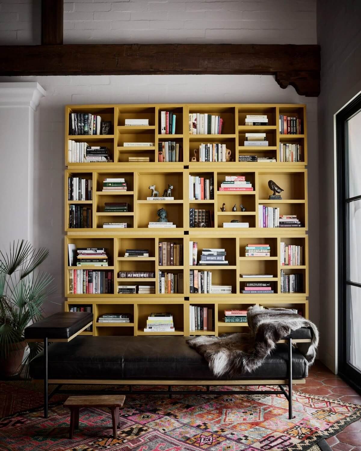 How To Style Terracotta Floor Tiles 9 reading-room-yellow-bookshelves-nordroom