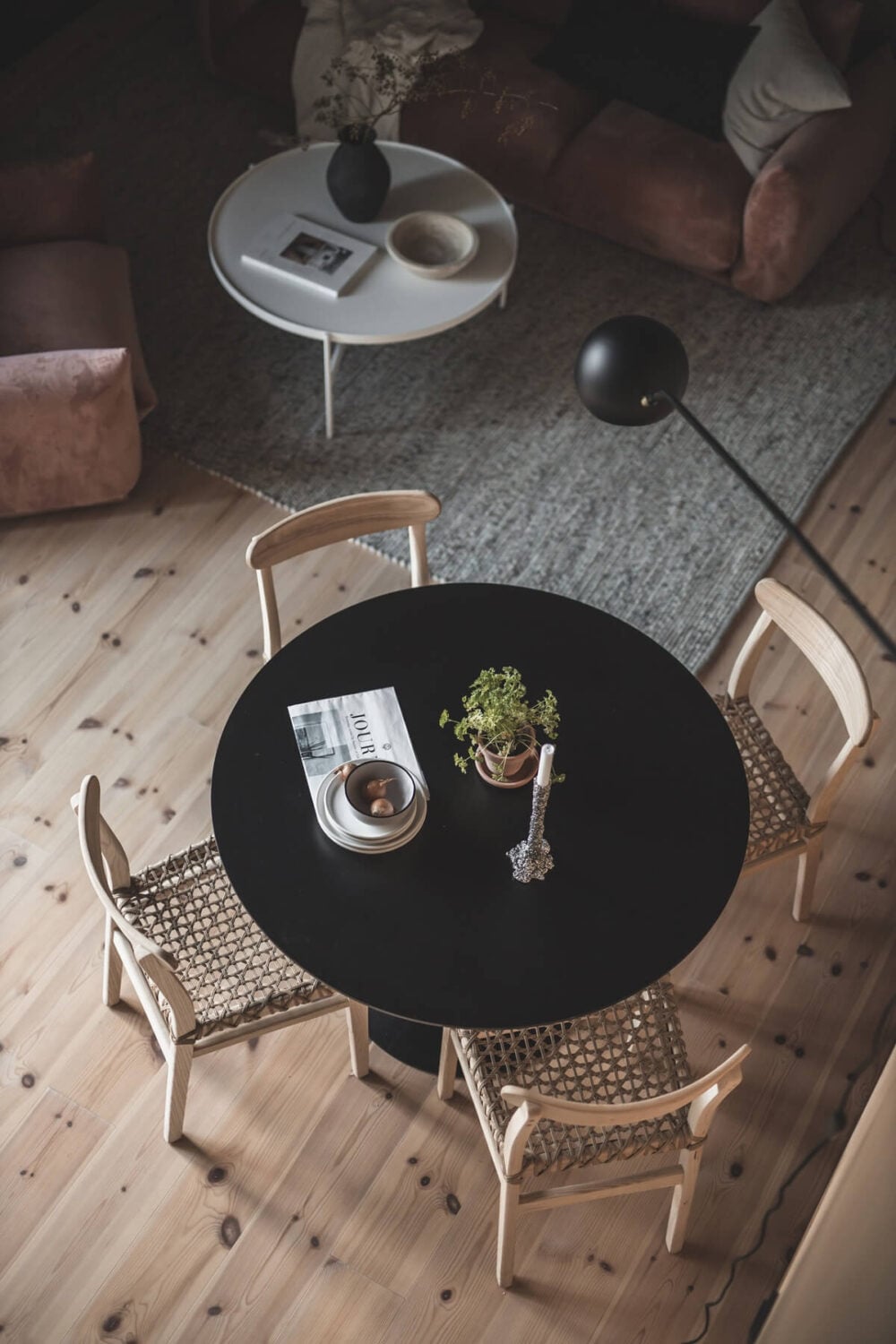 A Scandinavian Loft Made of Concrete and Wood 13 round-dining-table-wooden-floor-scandinavian-loft-nordroom