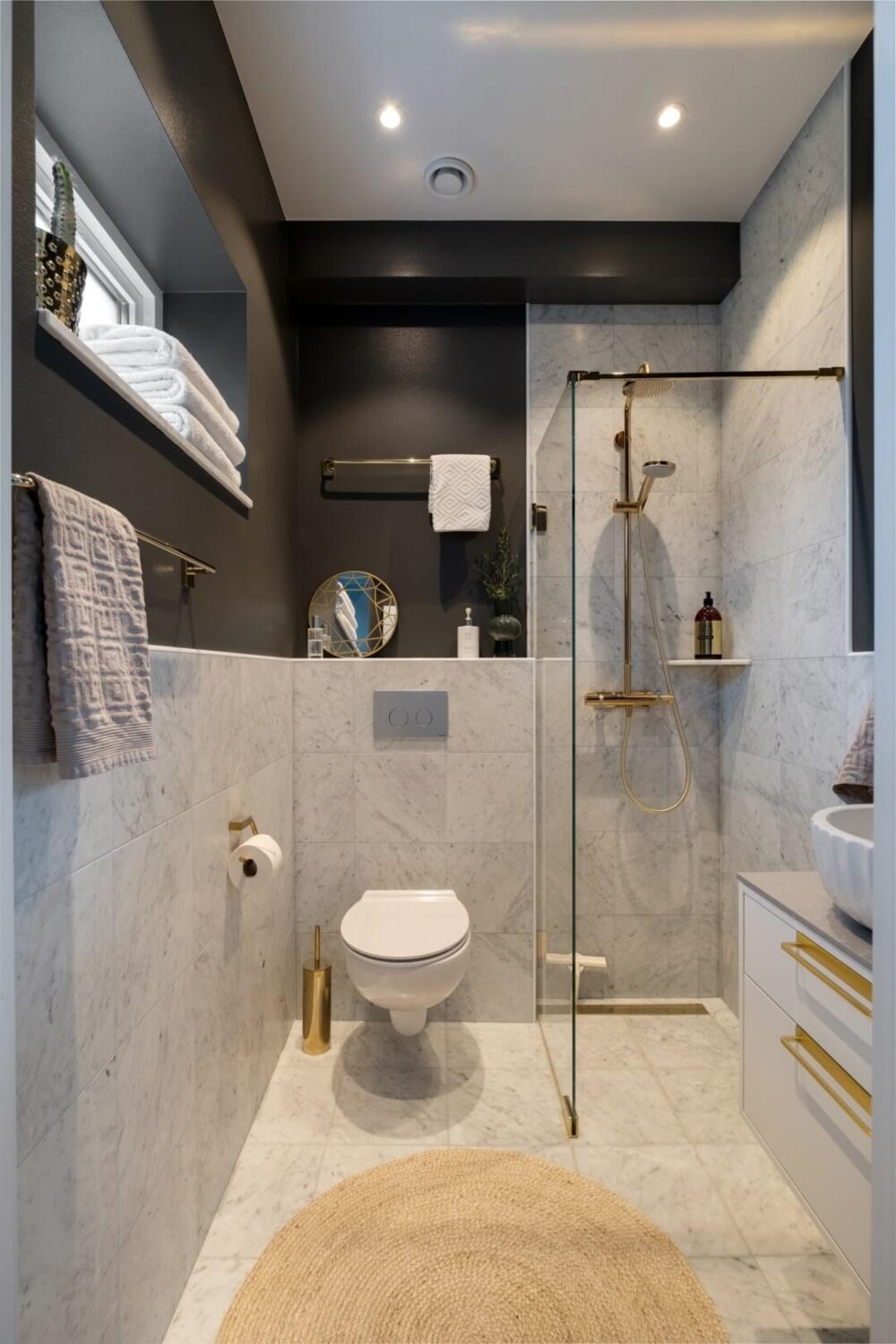 83 Small Bathroom Ideas & How To Make It Look Bigger 17 small-bathroom-dark-gray-walls-walk-in-shower-nordroom