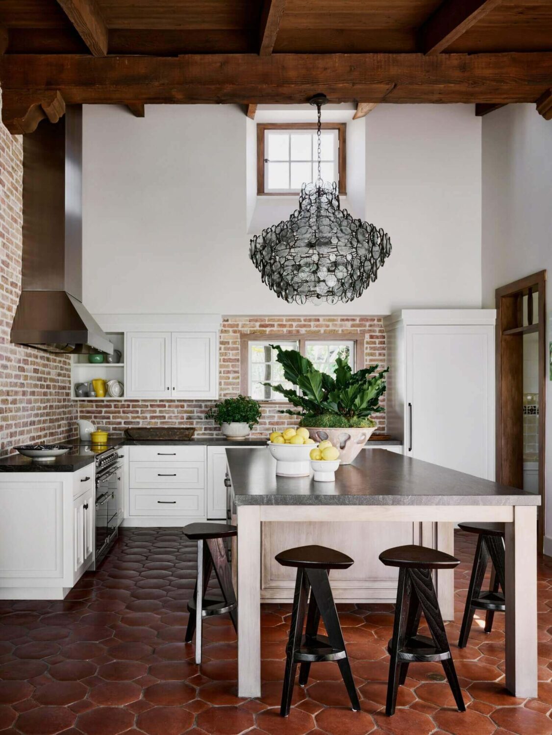 How To Style Terracotta Floor Tiles 27 spanish-style-hacienda-white-kitchen-terracotta-tile-nordroom