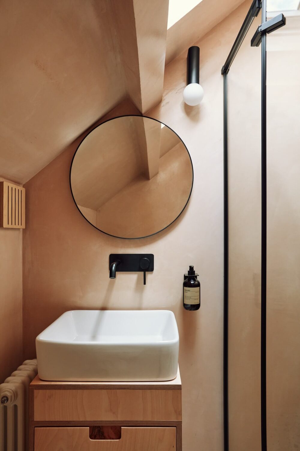 83 Small Bathroom Ideas & How To Make It Look Bigger 31 tiny-bathroom-sloped-ceiling-round-mirror-nordroom