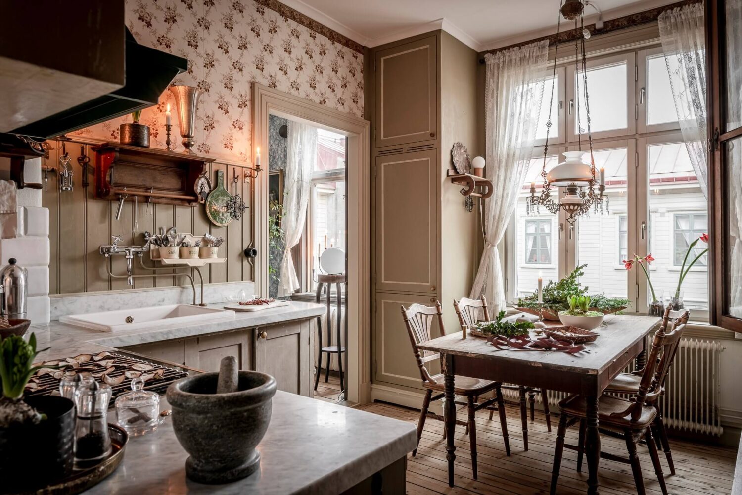 A Charming Vintage Apartment in Sweden 2 vintage-kitchen-antique-table-nordroom