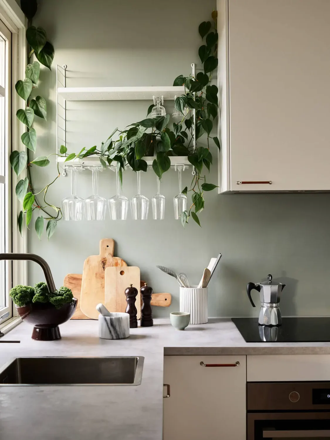 A Scandinavian Studio Apartment with Bed Nook 12 white-kitchen-plants-nordroom