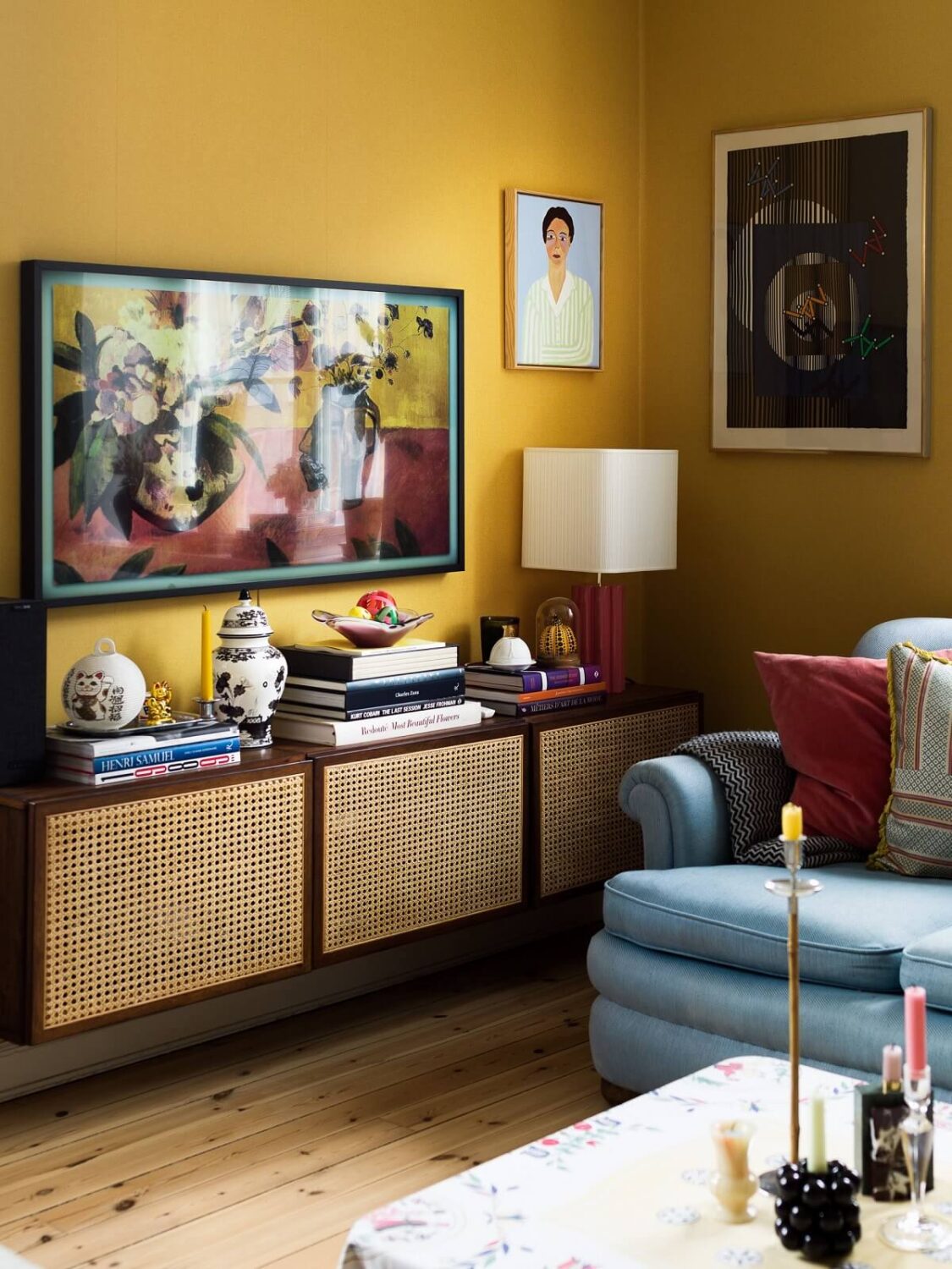 These Colorful Scandinavian Interiors Will Wow You 12 yellow-living-room-television-midcentury-cabinet-nordroom