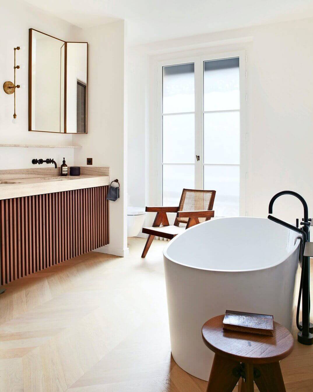 How To Style Your Home Like A Parisian Apartment 25 19th paris apartment modern classic design ribbed wood bathroom nordroom How To Style Your Home Like A Parisian Apartment