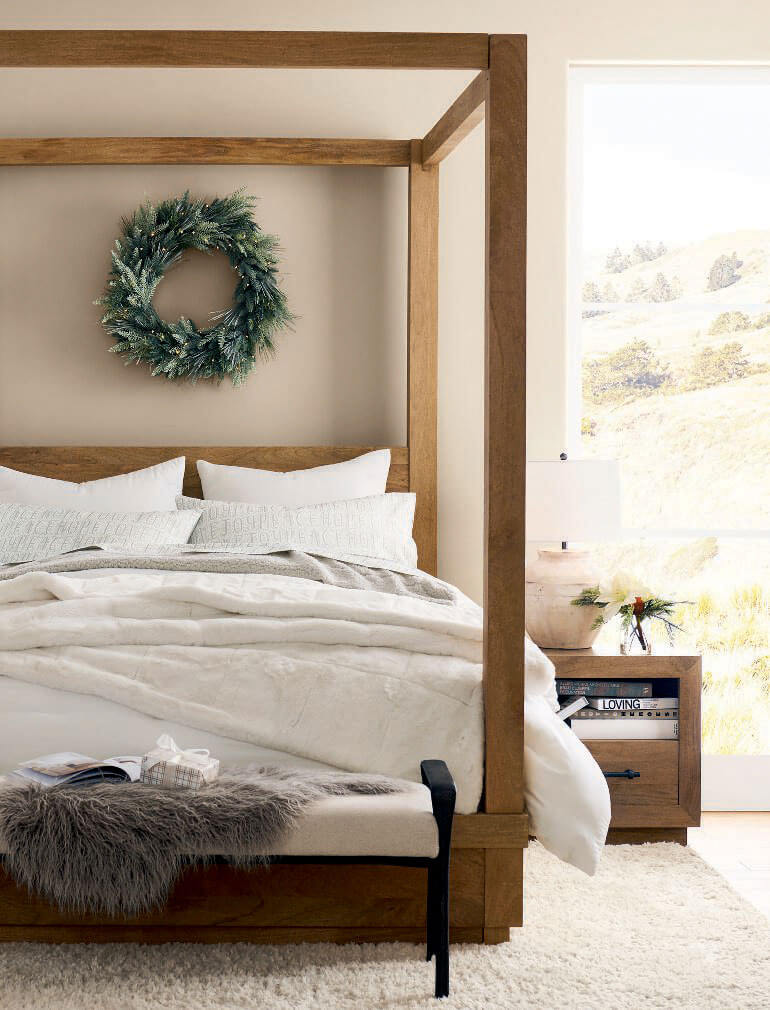 A Modern Rustic Home Decorated for Christmas 13 bedroom canopy bed christmas wreath nordroom A Modern Rustic Home Decorated for Christmas