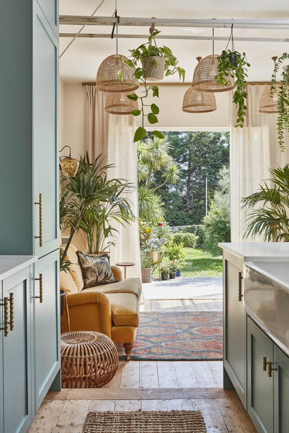 A Colorful 70s Inspired Home in London 5 light-blue-kitchen-plants-nordroom