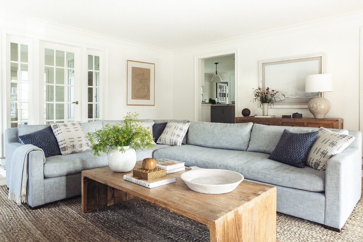 A Serene Colonial Home in Connecticut 6 living-room-blue-accent-color-wooden-coffee-table-nordroom