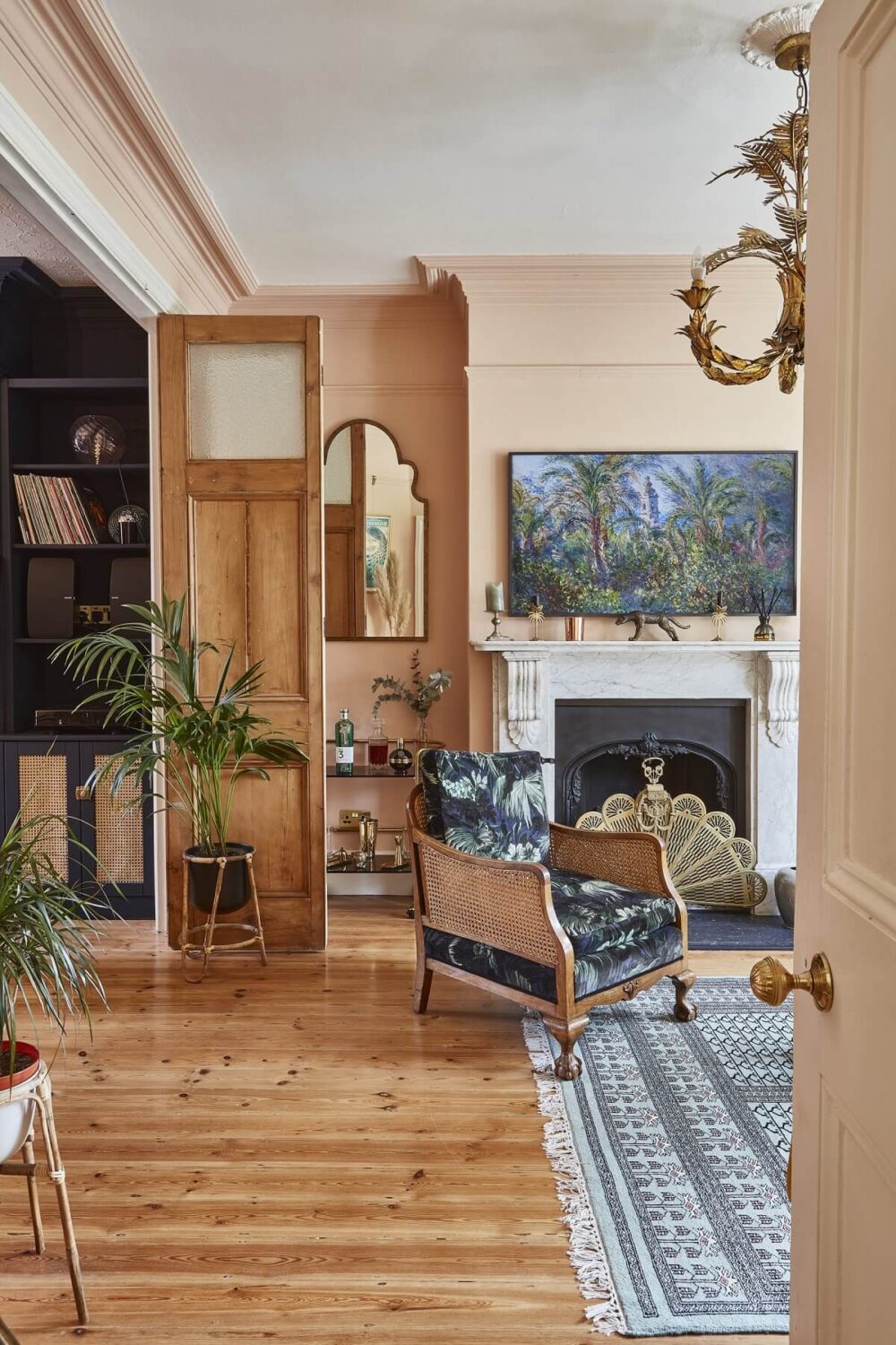 A Colorful 70s Inspired Home in London 14 living-room-wooden-floor-fireplace-nordroom