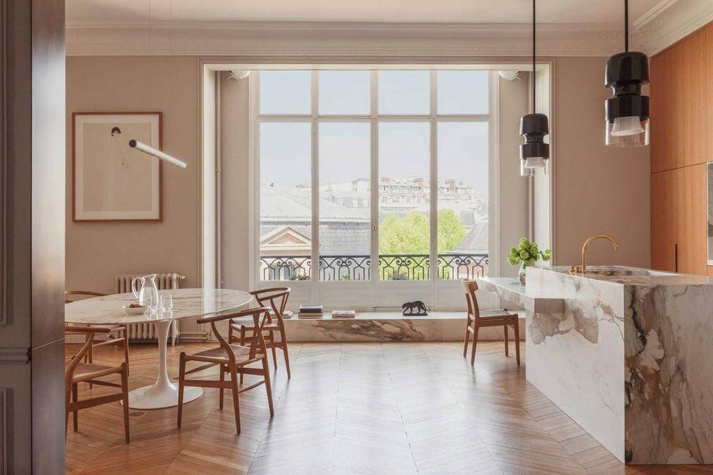 How To Style Your Home Like A Parisian Apartment 24 marble-kitchen-island-spacious-kitchen-parisian-apartments-nordroom
